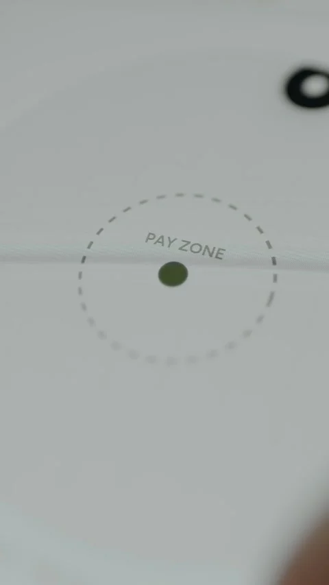 Mobile app showing ring dragged into pay zone for Geo-Auto Pay Stock Footage 332512399