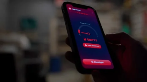 Mobile app showing sharp drop and shortage of fuel in storage facilities Stock Footage 341746627