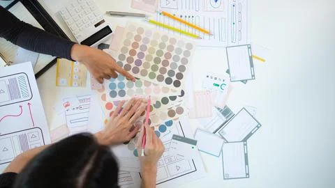 Mobile application developers are designing a ux ui system to make the disp.. Stock Photos