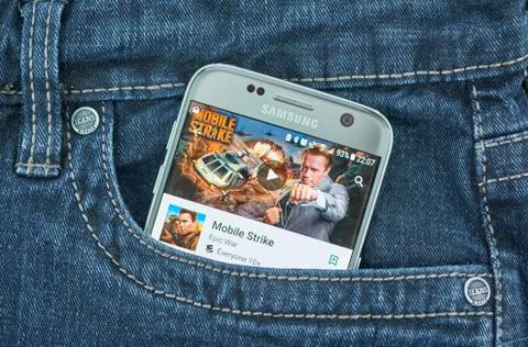 Mobile application on screen of Samsung Stock Photos