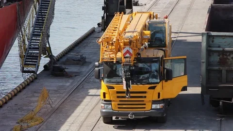 Mobile auto crane awaits construction start Stock Footage 120702518