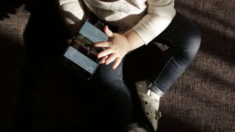 Mobile in baby's hands Stock Footage 72251270