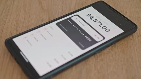 Mobile banking app with blocked virtual card, concept of poor financial Stock Footage 337998212