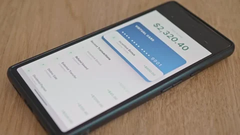Mobile banking app interface showing passive income, concept of passive income Stock Footage 337998789