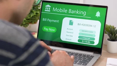 Mobile Banking on a Laptop Computer Transfers Money Online Stock Footage 115359564