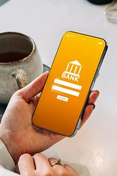 Mobile banking network. Smartphone with internet online bank application. Deb Stock Photos
