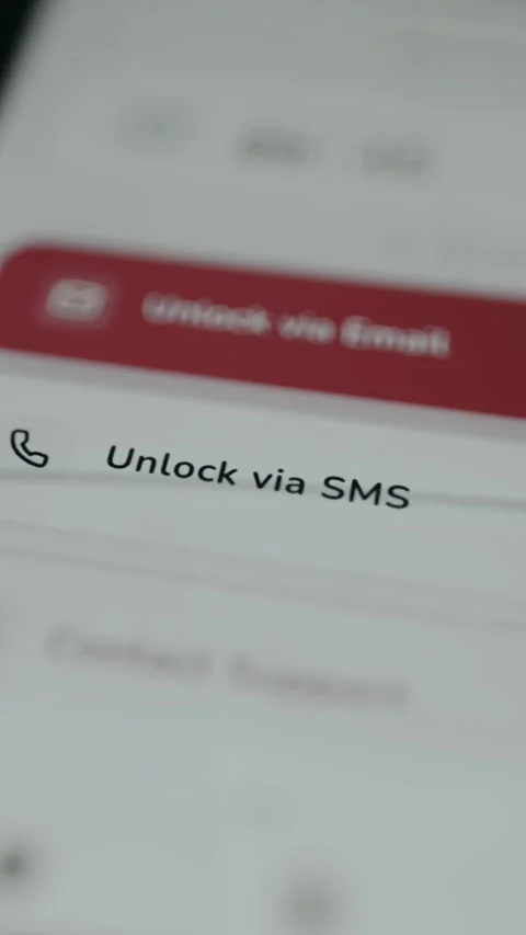 Mobile banking screen with Unlock via SMS option selected Stock Footage 333387546