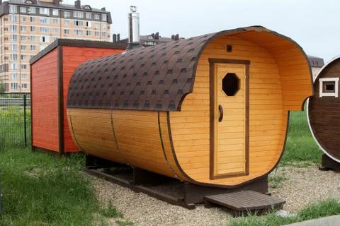 Mobile bath in the form of a barrel. Stock Photos