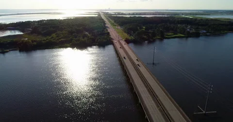 Mobile Bay Highway at sunset Stock Footage