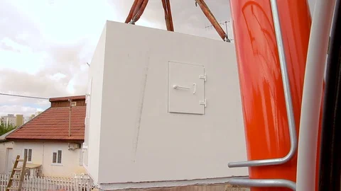 Mobile bomb shelter being deployed in a house in Israel Stock Footage 128036281