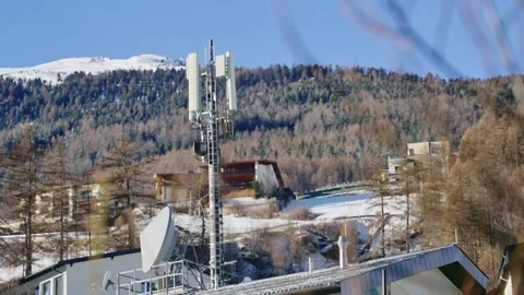 Mobile communication tower or antenna during cold winter season in Europe Stock Footage 319066547