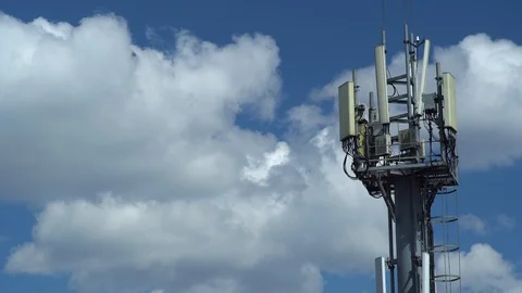 Mobile communications tower against the sky. time lapse Video stock 108705063