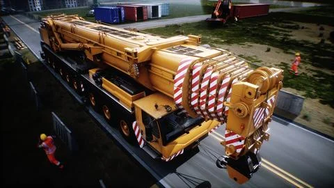 Mobile construction crane. Construction of a large industrial building or Ilustración de archivo