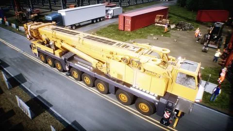 Mobile construction crane. Construction of a large industrial building or Ilustración de archivo