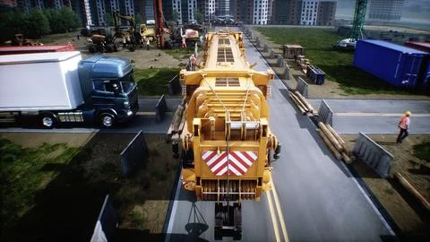 Mobile construction crane. Construction of a large industrial building or Ilustración de archivo