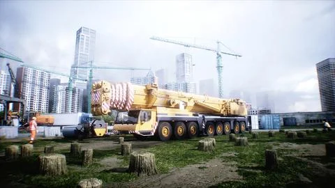 Mobile construction crane. Construction of a large industrial building or Ilustración de archivo