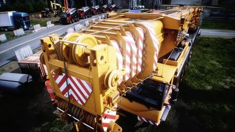 Mobile construction crane. Construction of a large industrial building or Ilustración de archivo