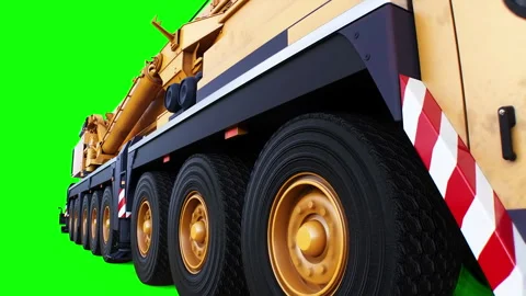 A mobile construction crane is moving. Rotation wheels. Green screen 4k isolate. Stock Footage 328525199