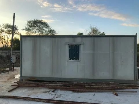 Mobile containers box at construction site Stock Photos