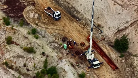 Mobile crane and drilling rig at Hambach open pit mine Germany Stock Footage 346580992