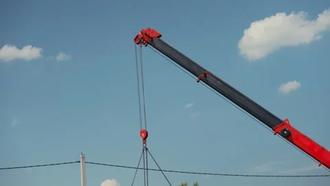 Mobile crane arm lifting heavy load Stock Footage 341294313