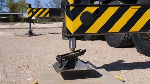 Mobile crane extending its legs Stock Footage 70051259