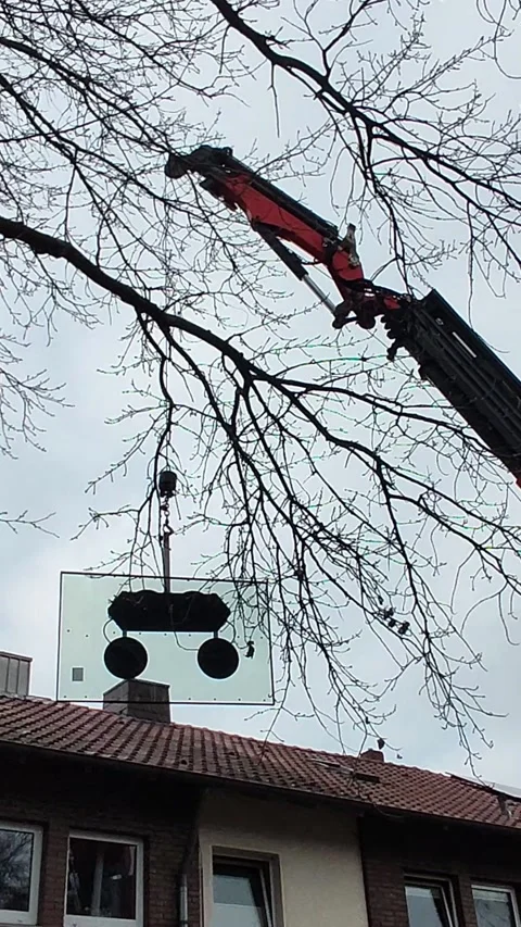 Mobile Crane Lifting Window Glass Panels Near Residential Building Stockbeeldmateriaal 336743709