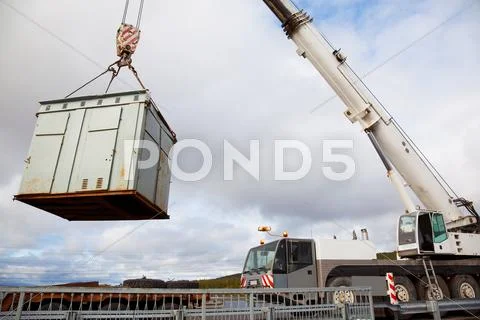 Mobile crane makes emergency operation on a motorway Stock Photos