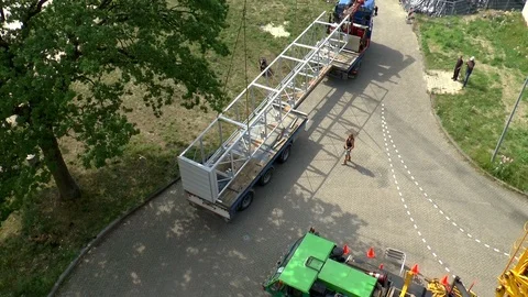 Mobile Crane Operator Unloading Elevator Shaft Top View Video stock 102227334