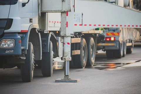 Mobile Crane Track On Construction Site: Deploying Hydraulic Leg Support Stock Photos