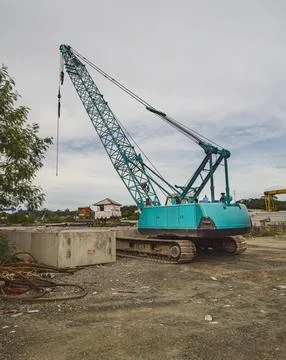 A mobile crawler crane from behind. Stock Photos