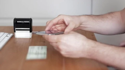 Mobile deposit of check using bank app on smartphone Stock Footage 74203187
