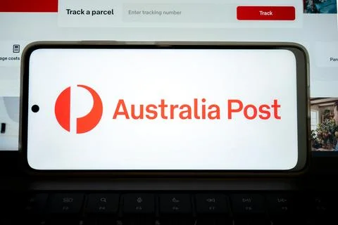 Mobile device displaying australia post logo and tracking form Stock Photos