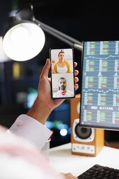 Mobile device displaying a video call Fotos Stock