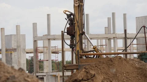Mobile drilling rig works at a building site. Concrete construction as a Video stock 85052876