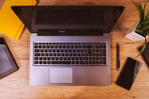 Mobile electronics on business office desktop Stock Photos