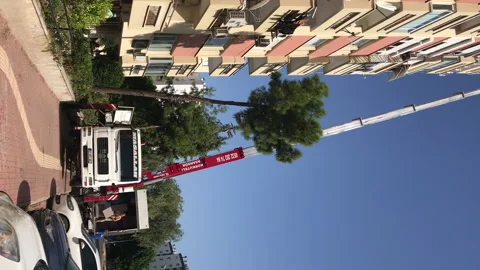 Mobile elevator for transporting household items to the upper floors. Car lift f Stock Footage 253738279