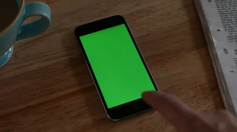 Mobile, with green screen, on table Video stock 44472979