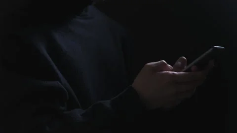 Mobile hacker attack online scam spy man phone Vidéo 157665879