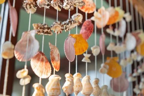 Mobile made from shells Hanging on the window Eye-catching colors When the wi Stock Photos