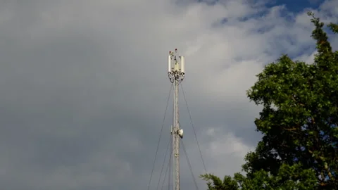 Mobile Network Communication Tower Against Cloudy Sky Stock Footage 336226815