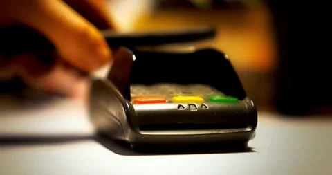 Mobile NFC payment technology POS terminal consumer business transaction paying Video stock 336585678