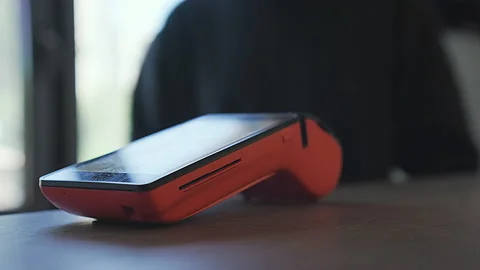 Mobile payment through the terminal Stock Footage 162909918