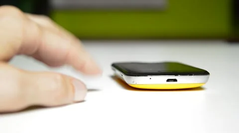 Mobile phone and hand, wating for a call Stock Footage 42887328