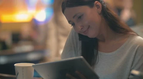 Mobile phone and touch pad take her time Stock Footage 52500960