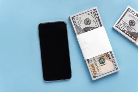 Mobile phone with a blank screen for inserting text, images and 50, 100 dolla Photos