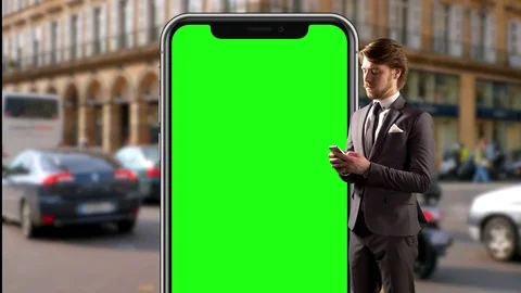 Mobile Phone with Busy Traffic Background Business Man Mobile Phone Close Up Video stock 84507271