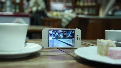 Mobile phone, cafeteria, coffee, image Stock Footage 50374729