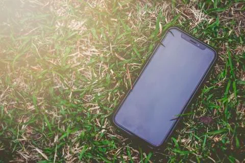 Mobile phone close up on background. Stock Photos