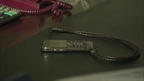 Mobile phone on the desk Stock Footage 252481930